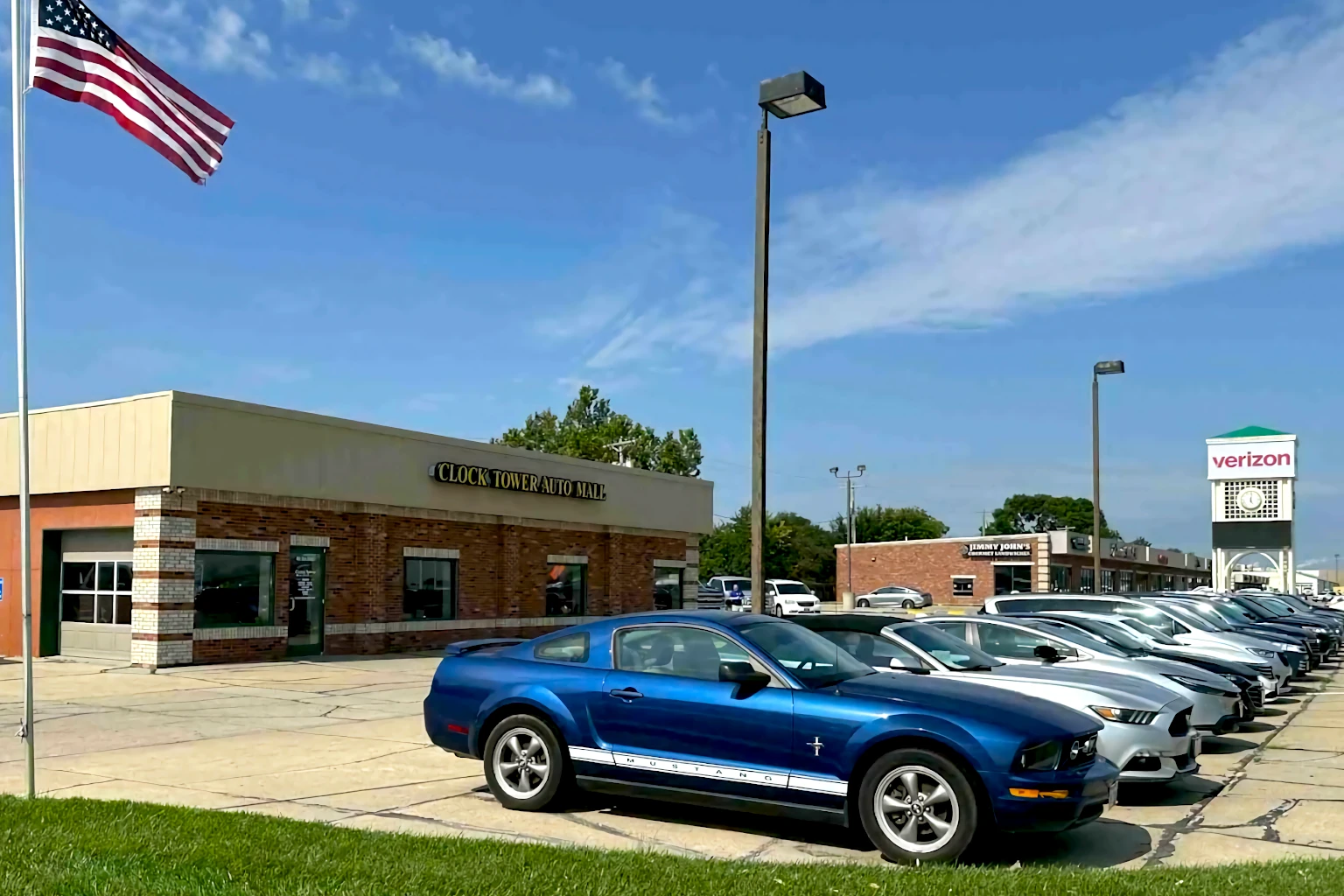Black 2023 Ford mustang on display at Clock Tower Auto Sales